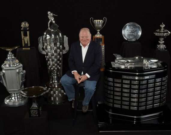Chip Ganassi with Trophies Compliments of Chip Ganassi Racing